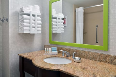 Two queens | Bathroom | Combined shower/tub, free toiletries, hair dryer, towels