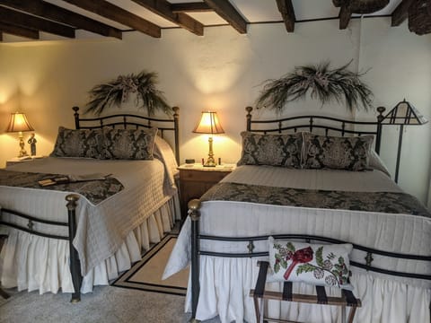 Room, 2 Queen Beds, Courtyard Area | Individually decorated, individually furnished, iron/ironing board