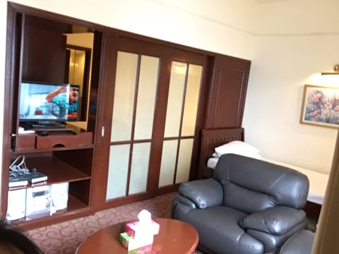 Studio | Living area | 32-inch LCD TV with cable channels, TV, DVD player