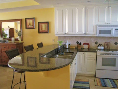 Condo, 2 Bedrooms, Ocean View, Beachfront | Private kitchen | Full-size fridge, microwave, oven, stovetop