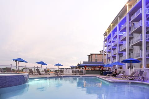 Seasonal outdoor pool, pool umbrellas, sun loungers