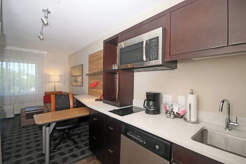 Studio, 1 King Bed with Sofa bed, Non Smoking | Private kitchen | Full-size fridge, microwave, stovetop, dishwasher