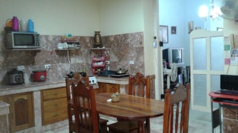 Triple Room, Smoking | Shared kitchen | Fridge, microwave, stovetop, coffee/tea maker