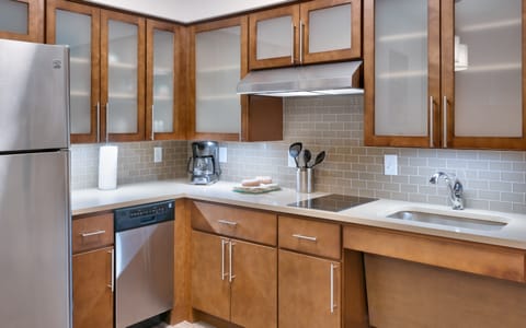 Studio Suite | Private kitchen | Full-size fridge, microwave, stovetop, dishwasher