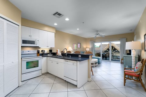 Deluxe Condo, 2 Bedrooms, 2 Bathrooms, City View (unit 204) | Private kitchen | Full-size fridge, microwave, stovetop, dishwasher