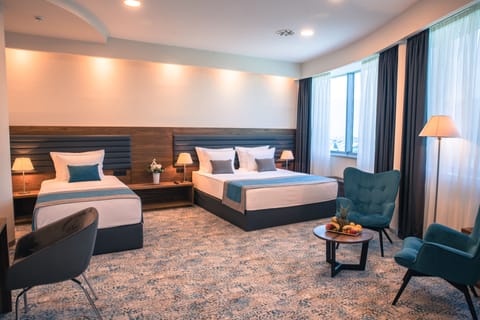 Premium Triple Room | Select Comfort beds, minibar, in-room safe, desk