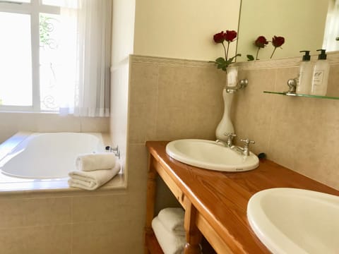 Luxury Room (with Bath and Shower) | Bathroom | Shower, free toiletries, hair dryer, towels