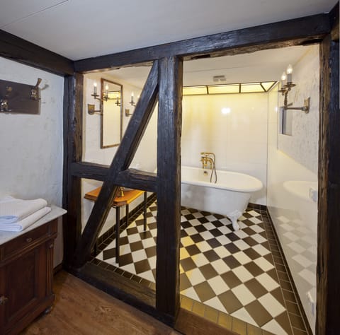 Suite (Habsberg) | Bathroom | Deep soaking tub, rainfall showerhead, hair dryer, bathrobes