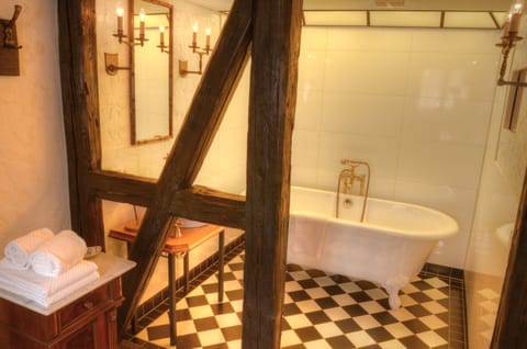 Suite (Habsberg) | Bathroom | Deep soaking tub, rainfall showerhead, hair dryer, bathrobes