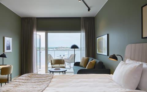 Junior Suite | 1 bedroom, in-room safe, iron/ironing board, free cribs/infant beds