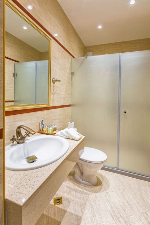 Classic Apartment, Multiple Beds | Bathroom | Shower, free toiletries, hair dryer, bathrobes