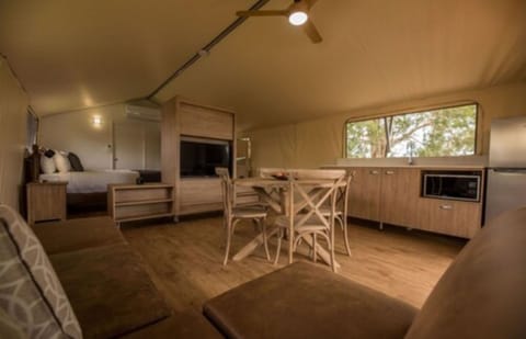 Deluxe Safari Tent | Living area | TV