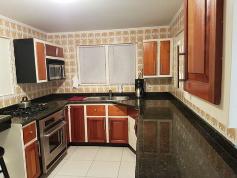 Basic Apartment, 2 Bedrooms, Non Smoking | Private kitchenette | Cookware/dishes/utensils, cleaning supplies