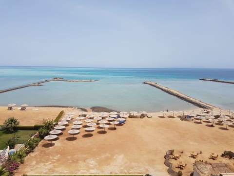 Private beach, beach umbrellas, beach bar