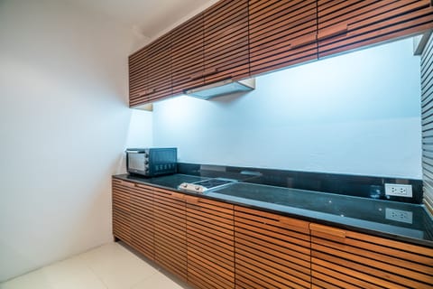 Exclusive Apartment, Private Pool | Private kitchen | Microwave, stovetop, electric kettle, toaster