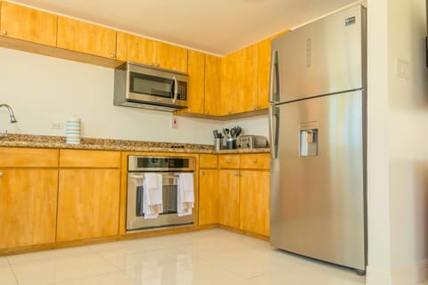 Family Townhome, 2 Bedrooms, Kitchen, Ocean View | Private kitchen | Full-size fridge, microwave, oven, stovetop