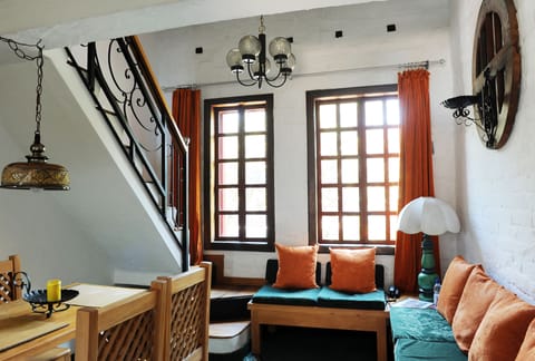 Two bedroom loft - 1 to 4 pax | Living room | 24-inch flat-screen TV with cable channels, Netflix, heated floors