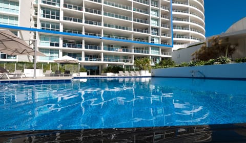 Outdoor pool, pool umbrellas, sun loungers