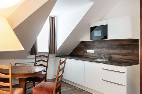 Suite, Multiple Beds, City View | Private kitchenette