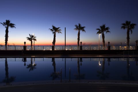 Indoor pool, outdoor pool, pool umbrellas, sun loungers