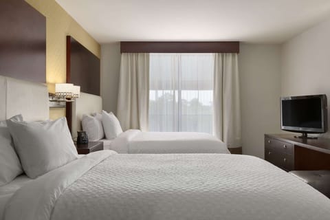 Two room suite two queens | Premium bedding, down comforters, pillowtop beds, in-room safe