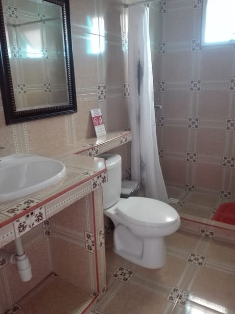 Deep soaking tub, rainfall showerhead, free toiletries, hair dryer