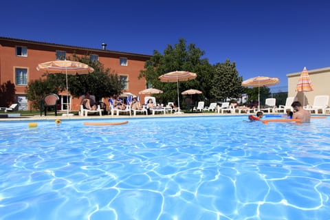 Seasonal outdoor pool, open 8:30 AM to 8:30 PM, pool umbrellas