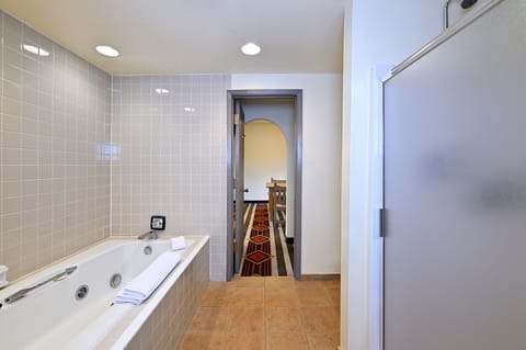 Suite, 1 King Bed (Sandia Kiva Suite) | Bathroom | Combined shower/tub, eco-friendly toiletries, hair dryer, towels