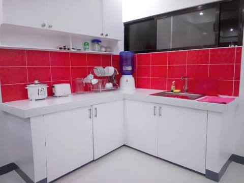 Apartment, 2 Bedrooms | Private kitchenette | Full-size fridge, stovetop, electric kettle, toaster