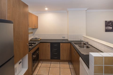 Two Bedroom Spa Apartment | Private kitchenette | Full-size fridge, microwave, oven, stovetop