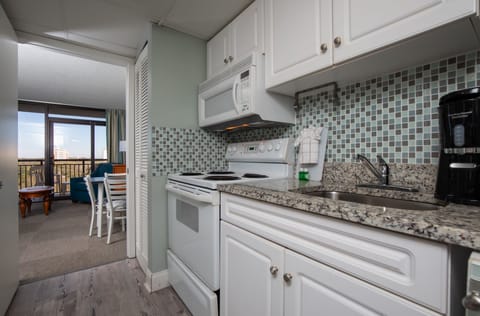 Standard Condo, Non Smoking, Partial Ocean View | Private kitchenette | Full-size fridge, microwave, oven, stovetop