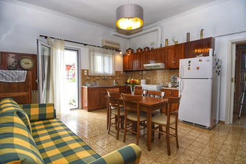 Apartment | Private kitchen | Full-size fridge, microwave, oven, stovetop