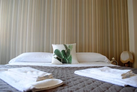 Down comforters, desk, free WiFi, bed sheets