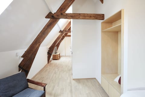 Family Room | Premium bedding, desk, laptop workspace, blackout drapes