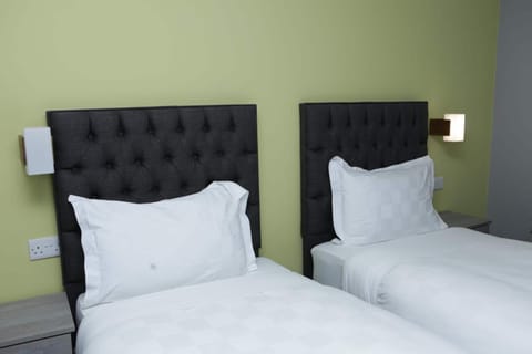 Desk, blackout drapes, soundproofing, iron/ironing board