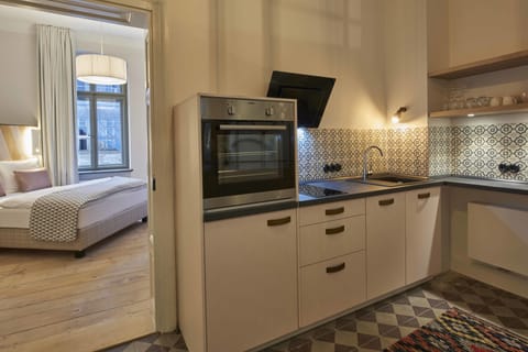 Classic Apartment, 1 Double Bed, Non Smoking | Private kitchen | Fridge, stovetop