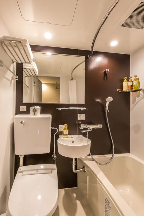 Basic Double Room | Bathroom | Free toiletries, hair dryer, slippers, electronic bidet