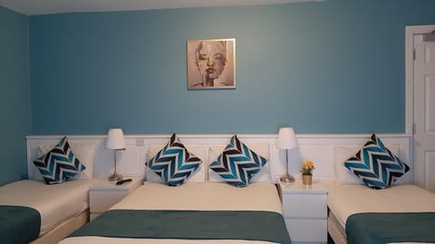 Family Room | Blackout drapes, iron/ironing board, free WiFi