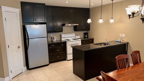 Condo, 2 Bedrooms, Kitchen | Private kitchen | Fridge, microwave, stovetop, dishwasher