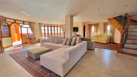 Casa Coco Penthouse | Living area | Flat-screen TV