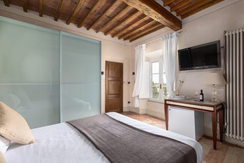 Down comforters, minibar, desk, blackout drapes