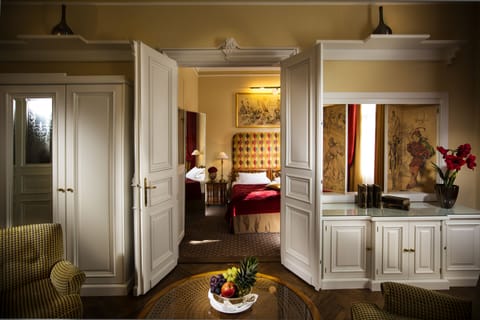 Senior Suite | 1 bedroom, free minibar items, in-room safe, individually decorated
