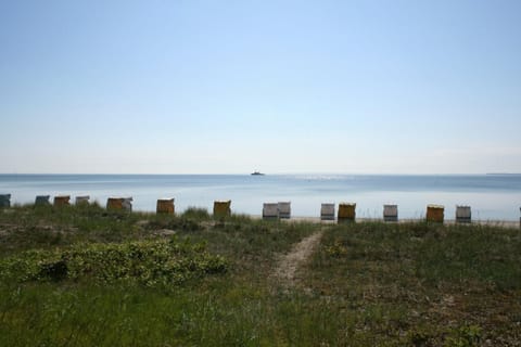 On the beach, white sand, beach cabanas