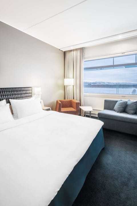 Premium Room (Fjord & Runway View) | Premium bedding, down comforters, pillowtop beds, minibar