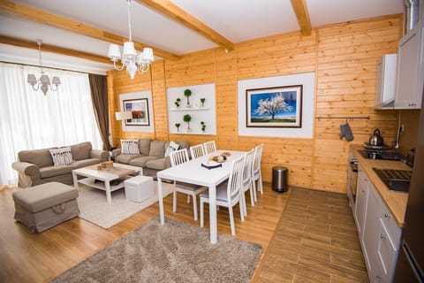 Chalet, 3 Bedrooms, Mountain View (7 adults) | Living area | Flat-screen TV, DVD player