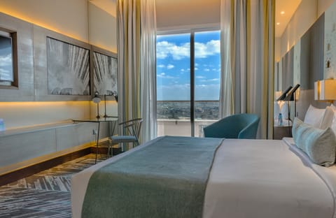 Premium Suite, Multiple Beds, Kitchenette | 1 bedroom, minibar, in-room safe, individually decorated