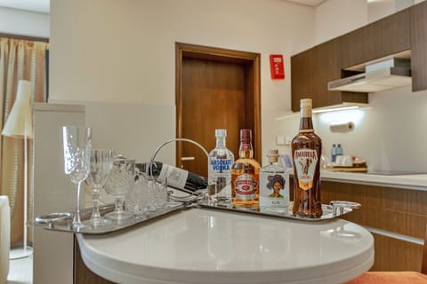 Premium Suite, Multiple Beds, Kitchenette | Private kitchen | Full-size fridge, microwave, stovetop, espresso maker