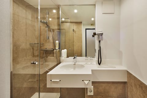 Shower, eco-friendly toiletries, hair dryer, towels