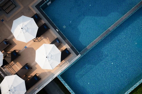 Outdoor pool, pool umbrellas, sun loungers