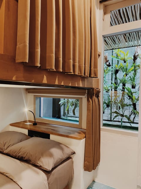 Shared Dormitory, Mixed Dorm, Courtyard View | In-room safe, blackout drapes, free WiFi, bed sheets